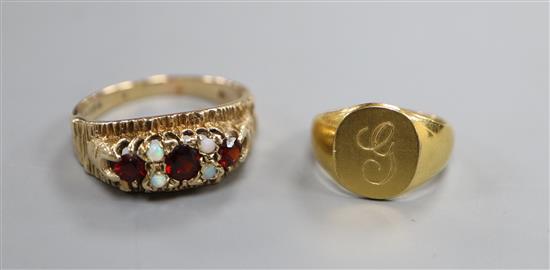 A 9ct gold ring, garnets and opals and a 10k gold filled signet ring.